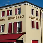 Righetto イン *
